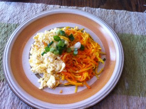 Top with scrambled eggs and scallions